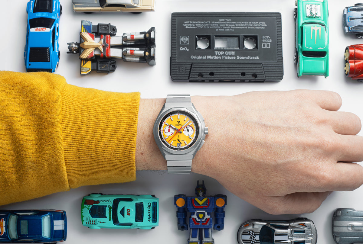 The Electro Yellow Vector worn among its retro design inspirations.